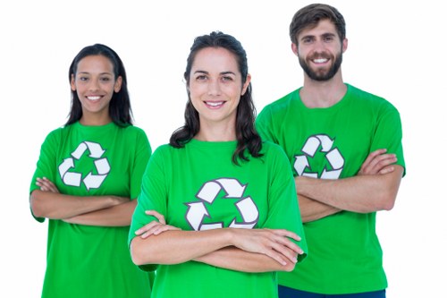 Professional staff sorting items for eco-friendly disposal